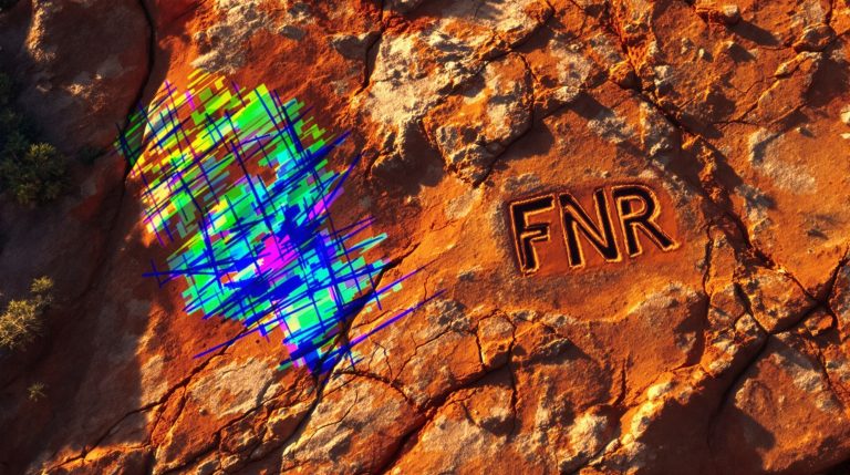 Far Northern Resources Ltd-FNR-FNR carved on textured rock surface.