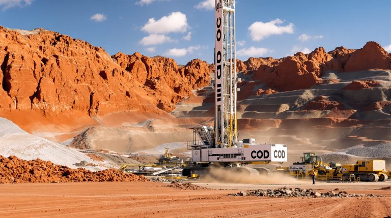 Coda Minerals Ltd-COD-Mining equipment operating in desert landscape.