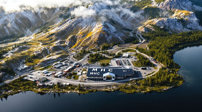 Manhattan Corporation Ltd-MHC-MHC building nestled in mountainous landscape.