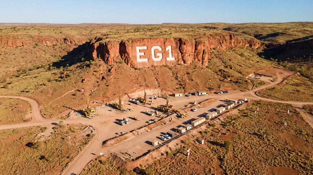 Evergold Minerals Ltd-EG1-EG1 drilling site with machinery and landscape.