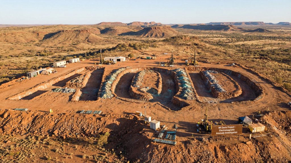 Ausquest Ltd-AQD-AICD logo formed on mining site.