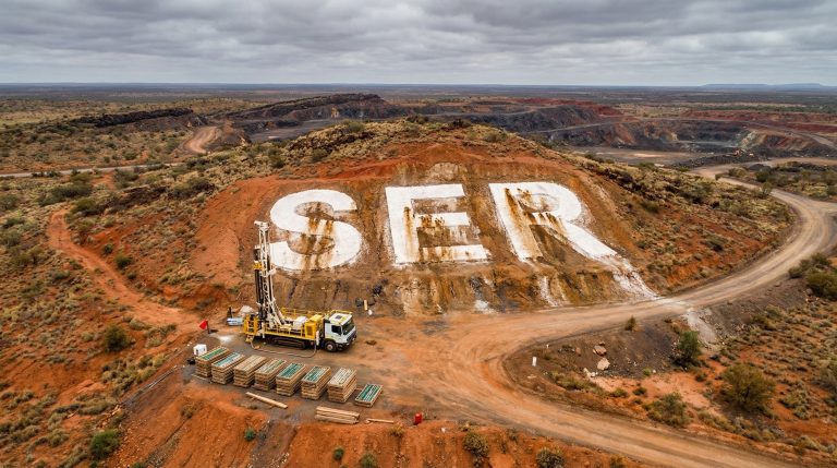 Strategic Energy Resources Ltd-SER-SER written on rugged hill landscape.