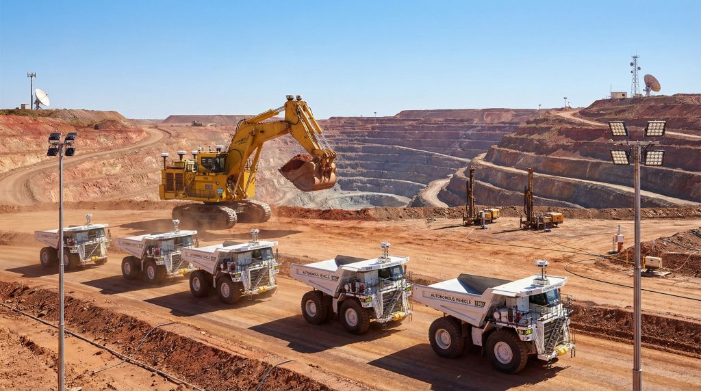 Autonomous vehicles operating in open-pit mine.