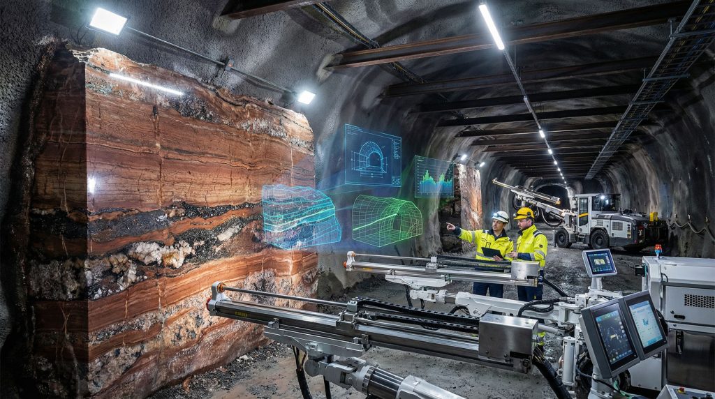 Engineers analyze geological data in mine.