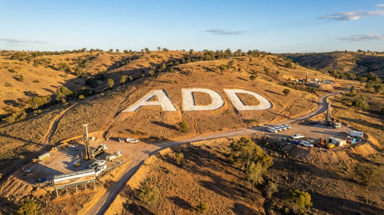 Adavale Resources Ltd-ADD-ADD letters on arid hillside landscape.