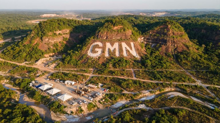 Gold Mountain Ltd-GMN-GMining Ventures aerial view with logo.
