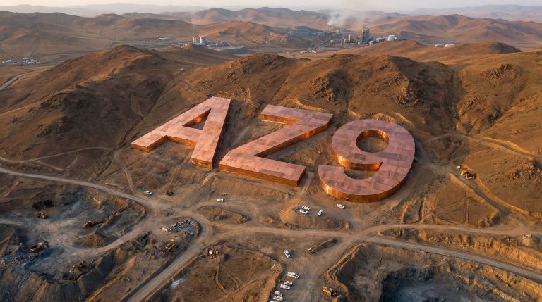 Asianbatterymet Plc Chess Depositary Interests 1:1-AZ9-AZG copper letters on desert landscape.