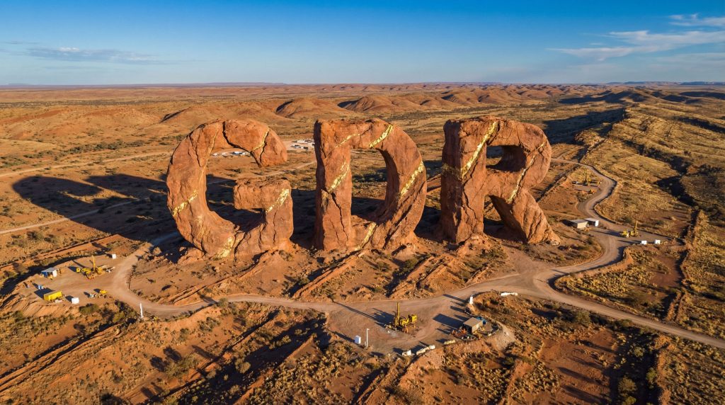 Golden Dragon Mining Ltd-GDR-GDR letters in arid landscape.
