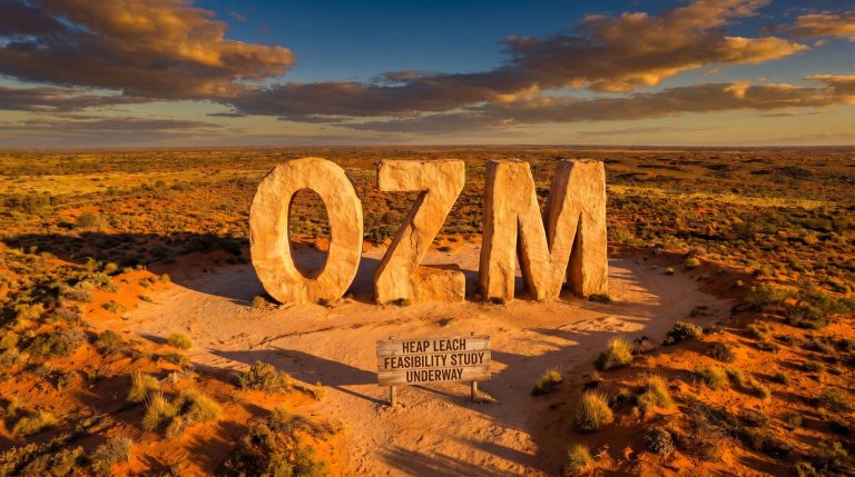 Ozaurum Resources Ltd-OZM-OZM desert monument with study sign
