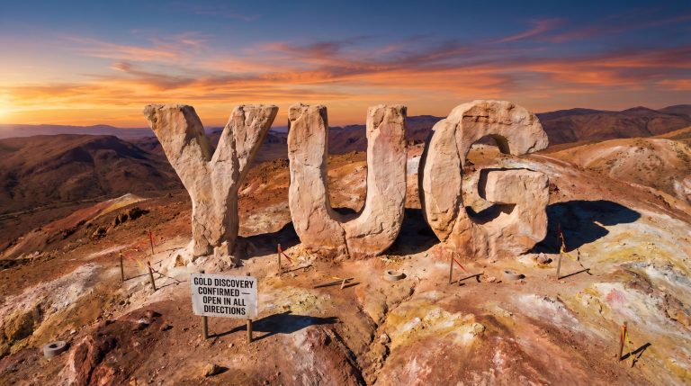 Yugo Metals Ltd-YUG-YUG mountain sign at sunset