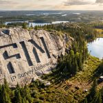 FIN Resources Ltd-FIN-IP Survey Underway on rocky cliff