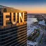 Fortuna Metals Ltd-FUN-fun skyscraper overlooking city skyline at sunset