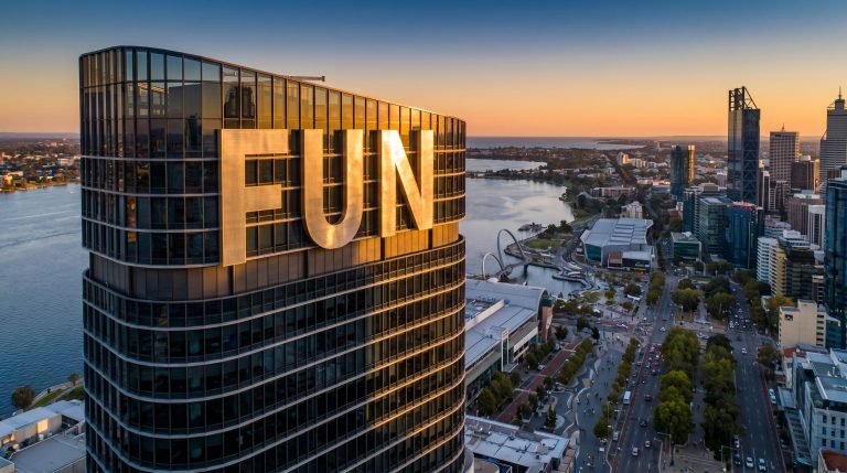Fortuna Metals Ltd-FUN-fun skyscraper overlooking city skyline at sunset