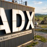 ADX Energy Ltd-ADX-ADX oilfield facility with pumpjacks and pipes