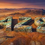 Azzuro Res Plc Chess Depositary Interests 1:1-AZ9-ATS stone letters in desert landscape