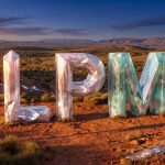 Lithium Plus Minerals Ltd-LPM-LPM crystal letters in desert landscape