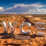 West Coast Silver Ltd-WCE-WCE sign overlooking desert outback site