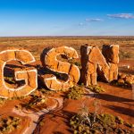 Great Southern Mining Ltd-GSN-GSN rock letters in desert landscape